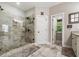 Elegant bathroom featuring spacious tiled walk-in shower and granite countertop vanity at 764 Little Vine Church Rd, Villa Rica, GA 30180