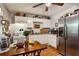 Well-equipped kitchen with white cabinets and stainless steel appliances at 792 Plainville Sw Cir, Atlanta, GA 30331