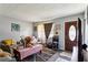 Cozy living room featuring comfy sofas, a coffee table, and decorative accents at 792 Plainville Sw Cir, Atlanta, GA 30331