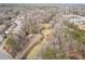 Large lot with a house, creek and surrounding woods at 1036 Wooten Lake Nw Rd, Kennesaw, GA 30144