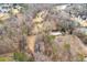 Aerial view of property showing large lot with trees and creek at 1036 Wooten Lake Nw Rd, Kennesaw, GA 30144