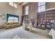 Spacious living room with a large brick fireplace and built-in shelving at 1036 Wooten Lake Nw Rd, Kennesaw, GA 30144