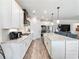 Modern kitchen with stainless steel appliances and large island at 1018 Cherry Bark Ln, Loganville, GA 30096