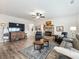 Spacious living room with hardwood floors and fireplace at 1018 Cherry Bark Ln, Loganville, GA 30096