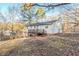 The house has a backyard with a wooden deck and a fence at 5925 S Quail Dr, Douglasville, GA 30135