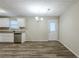 Open dining area with stainless steel appliances, granite countertops, and easy access to the backyard at 5925 S Quail Dr, Douglasville, GA 30135