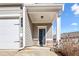 Townhome front entrance with covered porch and stone accents at 38 Rocky Knl, Dallas, GA 30157