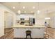 Kitchen with granite countertops, white cabinets, and island at 38 Rocky Knl, Dallas, GA 30157