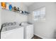 Laundry room with washer, dryer, and shelving at 38 Rocky Knl, Dallas, GA 30157