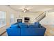 Living room with sectional sofa, fireplace, and hardwood floors at 38 Rocky Knl, Dallas, GA 30157