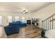 Spacious living room with fireplace, hardwood floors, and large windows at 38 Rocky Knl, Dallas, GA 30157