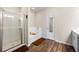Main bathroom with soaking tub, walk-in shower, and double vanity at 38 Rocky Knl, Dallas, GA 30157
