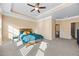 Bright main bedroom with ceiling fan and en-suite bathroom access at 38 Rocky Knl, Dallas, GA 30157