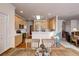 Open-concept kitchen with stainless steel appliances and seamless flow into the living area at 5712 Overlook Cir, Powder Springs, GA 30127