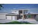 Two-story house with stone accents and a three-car garage at 1173 Veltre Sw Cir, Atlanta, GA 30311