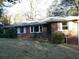 Charming brick home with well-maintained landscaping and a classic design at 1634 Willis Mill Sw Rd, Atlanta, GA 30311