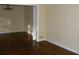 Spacious living area with hardwood floors and a chandelier at 1634 Willis Mill Sw Rd, Atlanta, GA 30311