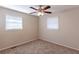 Spacious bedroom with neutral colored walls and carpet flooring at 404 Utoy Sw Cir, Atlanta, GA 30331