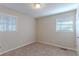 Spacious bedroom with two windows and neutral walls at 404 Utoy Sw Cir, Atlanta, GA 30331