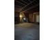 Unfinished basement with high ceilings and ample storage potential at 6871 Lakeshore Dr, Douglasville, GA 30135