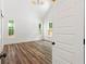 Spacious bedroom with hardwood floors and abundant natural light at 153 Palisade Dr, Rydal, GA 30171