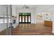 Open living area with hardwood floors, fireplace, and pool access at 153 Palisade Dr, Rydal, GA 30171
