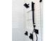 A clean, modern shower with black fixtures and white subway tile at 153 Palisade Dr, Rydal, GA 30171