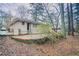 An exterior view showcasing the home's back entrance and patio area at 2534 Ben Hill Rd, Atlanta, GA 30344