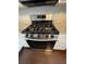 Stainless steel gas range with five burners and oven at 211 Buckland Dr, Alpharetta, GA 30022