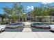 Community courtyard with seating and landscaping at 5230 Heirloom Overlook, Cumming, GA 30040