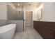 Modern bathroom with double vanity, soaking tub and shower at 620 Goldsmith Ct # 107, Johns Creek, GA 30022