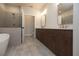 Modern bathroom with double vanity, soaking tub and shower at 620 Goldsmith Ct # 107, Johns Creek, GA 30022