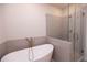 Modern bathroom with soaking tub and shower at 620 Goldsmith Ct # 107, Johns Creek, GA 30022