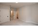 Bright bedroom with ensuite bathroom and carpet flooring at 620 Goldsmith Ct # 107, Johns Creek, GA 30022