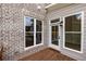 Deck with exterior access and brick wall at 620 Goldsmith Ct # 107, Johns Creek, GA 30022