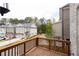 Private deck overlooking townhomes and wooded area at 620 Goldsmith Ct # 107, Johns Creek, GA 30022
