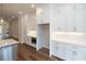 Built-in microwave and white shaker cabinets in kitchen at 620 Goldsmith Ct # 107, Johns Creek, GA 30022
