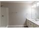 Clean bathroom, featuring a shower and double vanity at 5725 Twain Dr, Ellenwood, GA 30294