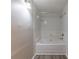 Clean bathroom with a tub and shower at 5725 Twain Dr, Ellenwood, GA 30294