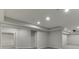 Finished basement with recessed lighting and herringbone floors at 1400 Cresthaven Ln, Lawrenceville, GA 30043