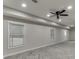 Spacious finished basement with herringbone tile floor and recessed lighting at 1400 Cresthaven Ln, Lawrenceville, GA 30043