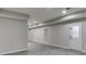 Basement with herringbone tile floor and exterior access at 1400 Cresthaven Ln, Lawrenceville, GA 30043