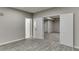 Finished basement features gray tile floors and multiple doors at 1400 Cresthaven Ln, Lawrenceville, GA 30043