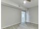 Finished basement room with doors and tile floor at 1400 Cresthaven Ln, Lawrenceville, GA 30043
