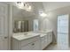 Bathroom boasts double vanity and large mirror at 1400 Cresthaven Ln, Lawrenceville, GA 30043