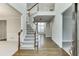 Two-story foyer with hardwood floors, staircase, and balcony at 1400 Cresthaven Ln, Lawrenceville, GA 30043