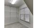 Large walk-in closet with wire shelving at 1400 Cresthaven Ln, Lawrenceville, GA 30043