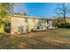 Backyard featuring lawn, chain link fence, mature trees and basement walkout at 1927 Cindy Dr, Decatur, GA 30032