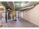 Unfinished basement with exposed ceiling, utilities, and painted brick walls offering potential for customization at 1927 Cindy Dr, Decatur, GA 30032