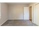 Bright bedroom with plush carpet, neutral walls, and natural lighting at 1927 Cindy Dr, Decatur, GA 30032